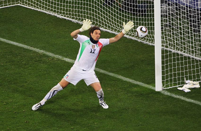 Italy goalkeeper Federico Marchetti keeps Paraguay at bay.